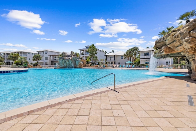 258 Tropical Breeze Dr, Santa Rosa Beach, FL 32459 - community pool with a residential view and a patio area