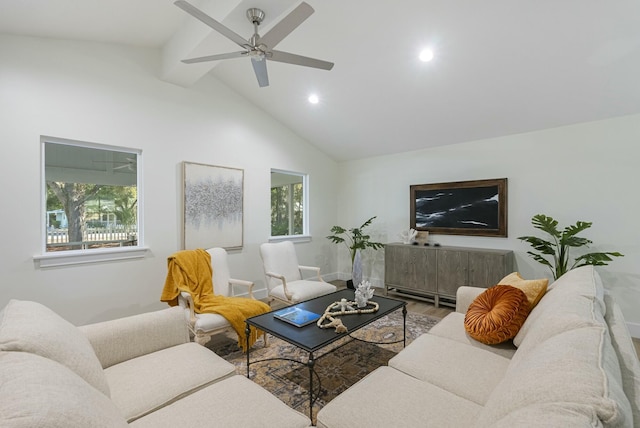 living room featuring ceiling fan and vaulted ceiling with beams