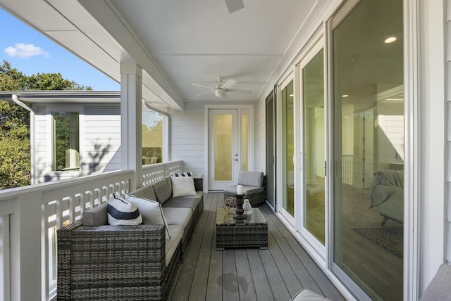 sunroom / solarium with ceiling fan