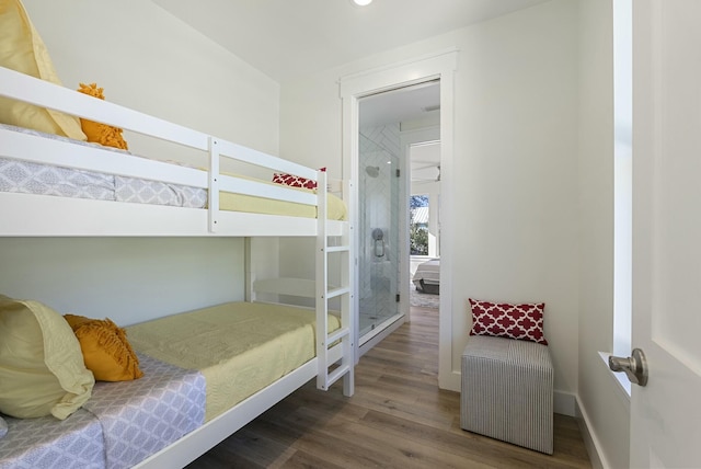 bedroom featuring dark hardwood / wood-style flooring