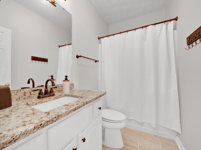 full bathroom featuring vanity, toilet, and shower / bath combo