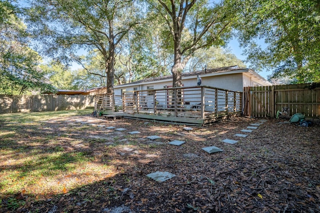 view of yard featuring a deck