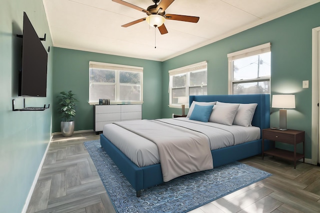 bedroom featuring ceiling fan, parquet floors, and crown molding