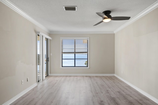 unfurnished room featuring a textured ceiling, light hardwood / wood-style floors, ceiling fan, and crown molding