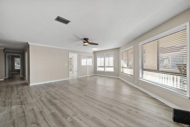 unfurnished living room with ceiling fan, light wood-type flooring, and crown molding