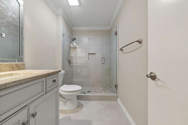 bathroom featuring tile patterned floors, toilet, vanity, a shower with shower door, and ornamental molding