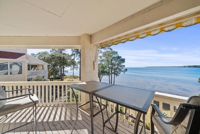 deck featuring a water view