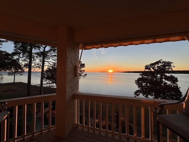 deck at dusk with a water view