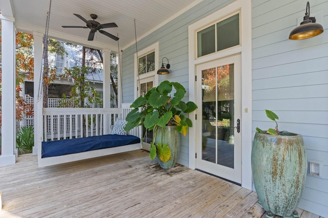 exterior space featuring ceiling fan