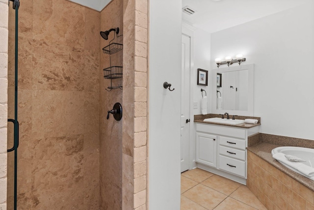 bathroom featuring separate shower and tub, tile patterned flooring, and vanity