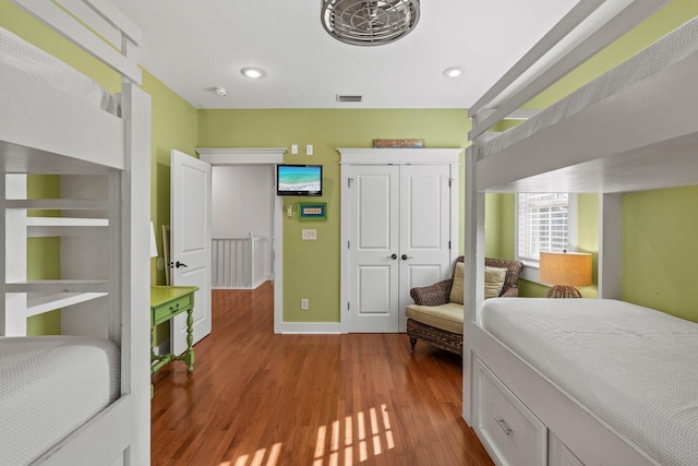 bedroom with light hardwood / wood-style floors