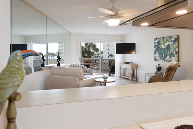 living room featuring ceiling fan