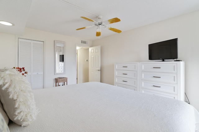 bedroom featuring a closet and ceiling fan