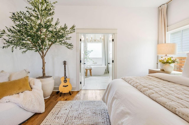 bedroom featuring hardwood / wood-style flooring