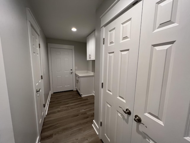 hallway featuring dark hardwood / wood-style floors