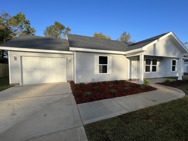 ranch-style house featuring a garage