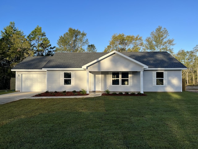 ranch-style home featuring a front yard and a garage