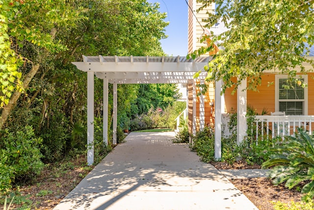 view of home's community with a pergola