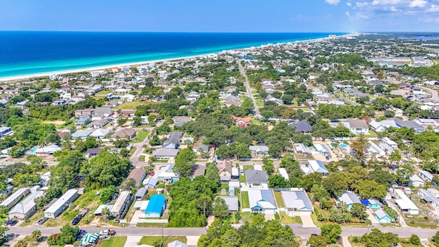 drone / aerial view with a view of the beach and a water view