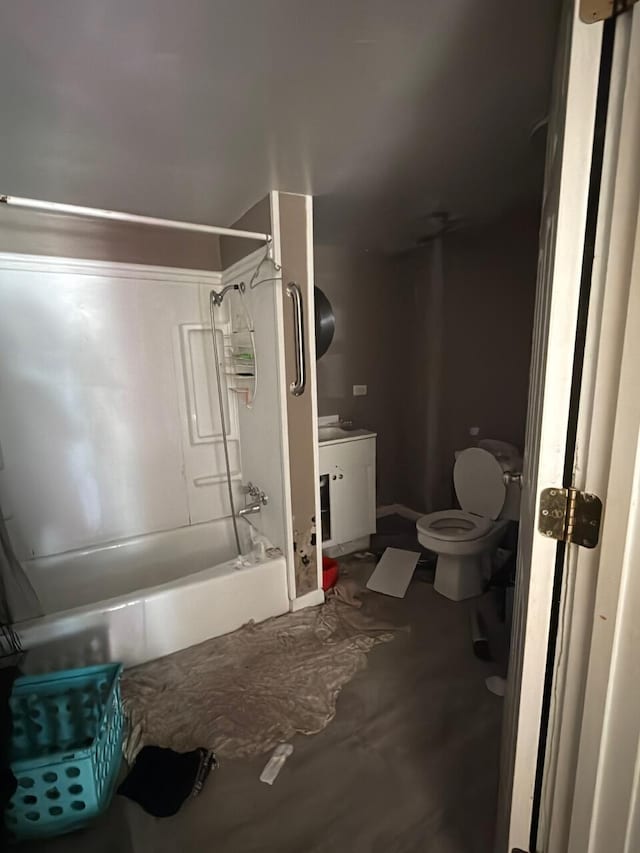 bathroom with shower / bath combination, toilet, and vanity