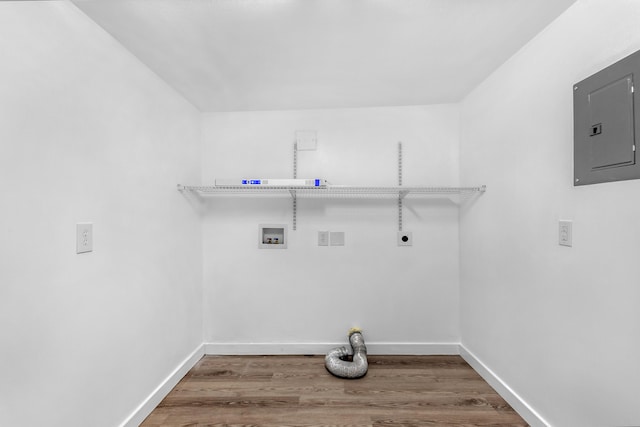 laundry room featuring hookup for a washing machine, electric panel, electric dryer hookup, and wood-type flooring