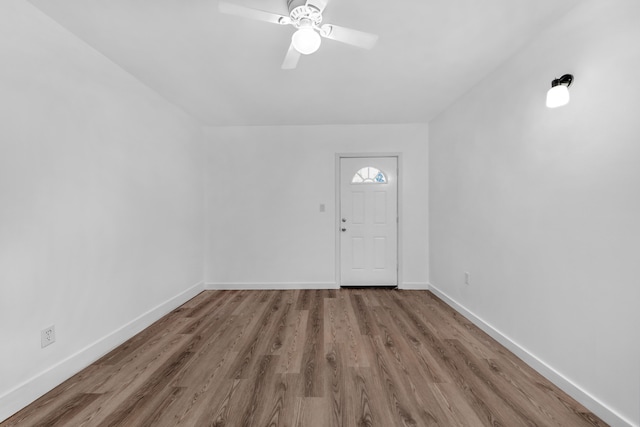 entrance foyer with hardwood / wood-style floors and ceiling fan