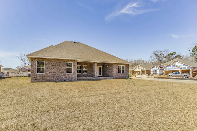 view of front of property with a front lawn