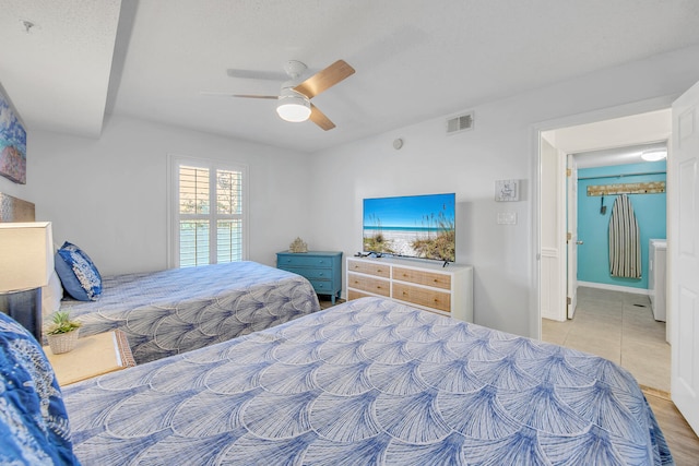 376 Santa Rosa Boulevard Unit 112 - 2Nd Floor, Fort Walton Beach, FL 32548 - bedroom with ceiling fan and a textured ceiling