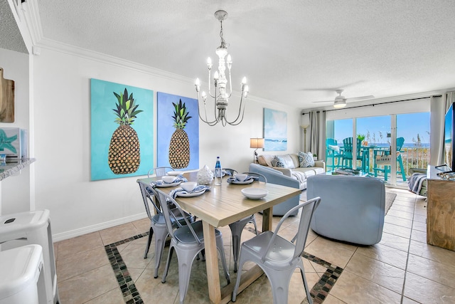 376 Santa Rosa Boulevard Unit 112 - 2Nd Floor, Fort Walton Beach, FL 32548 - tiled dining area featuring ceiling fan with notable chandelier, ornamental molding, and a textured ceiling