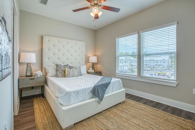 bedroom with ceiling fan and wood-type flooring