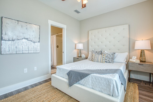 bedroom featuring ensuite bath, ceiling fan, and hardwood / wood-style flooring