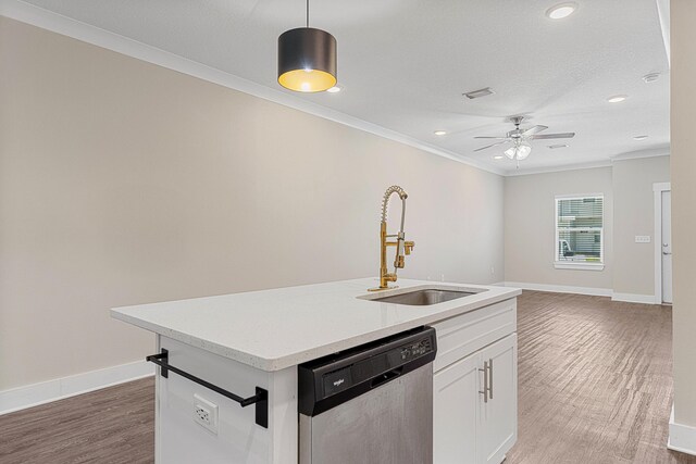 182 N Sand Palm Rd, Freeport, FL 32439 - kitchen with dishwasher, a sink, crown molding, wood finished floors, and ceiling fan