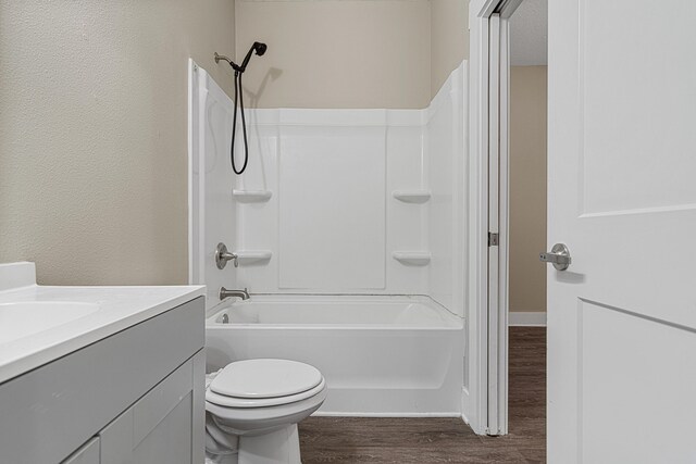 182 N Sand Palm Rd, Freeport, FL 32439 - bathroom featuring wood finished floors, shower / washtub combination, vanity, and toilet