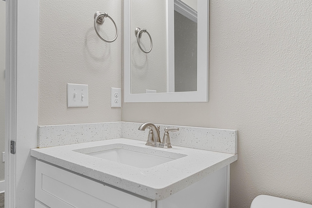 182 N Sand Palm Rd, Freeport, FL 32439 - bathroom with vanity and toilet