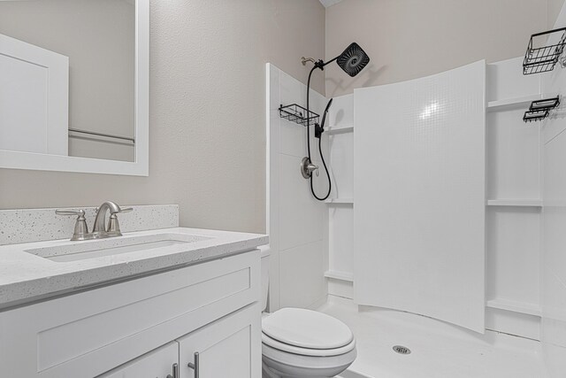 182 N Sand Palm Rd, Freeport, FL 32439 - bathroom with a shower, toilet, and vanity