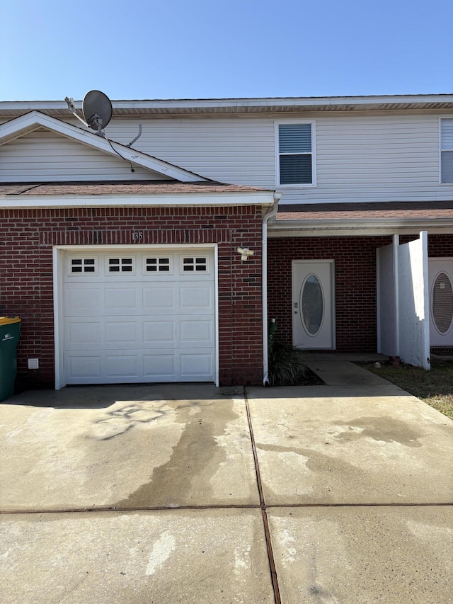 view of front of property featuring a garage