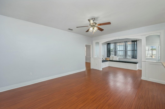 spare room featuring hardwood / wood-style flooring and ceiling fan