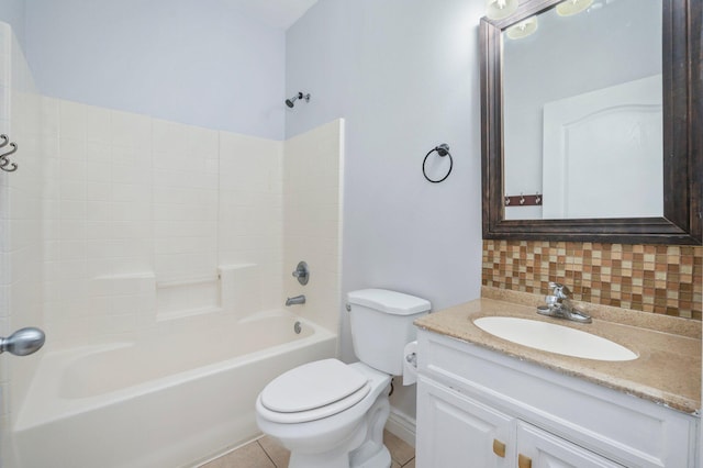 full bathroom featuring washtub / shower combination, tile patterned flooring, backsplash, toilet, and vanity