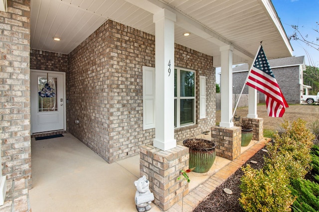 property entrance featuring covered porch