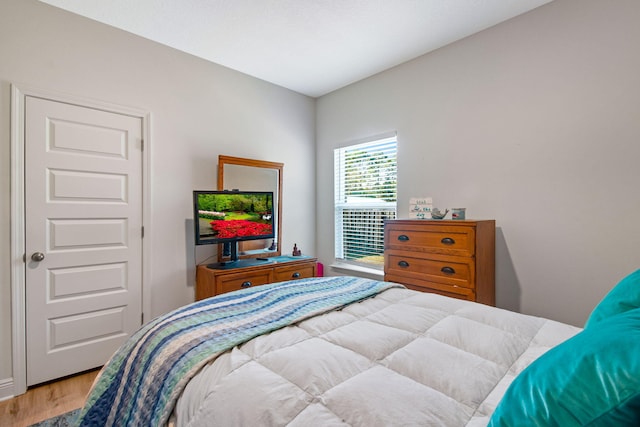 bedroom with light wood-type flooring