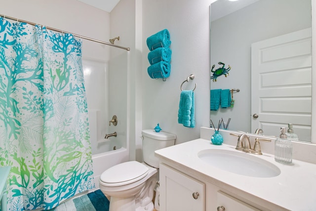 full bathroom featuring vanity, toilet, and shower / tub combo with curtain