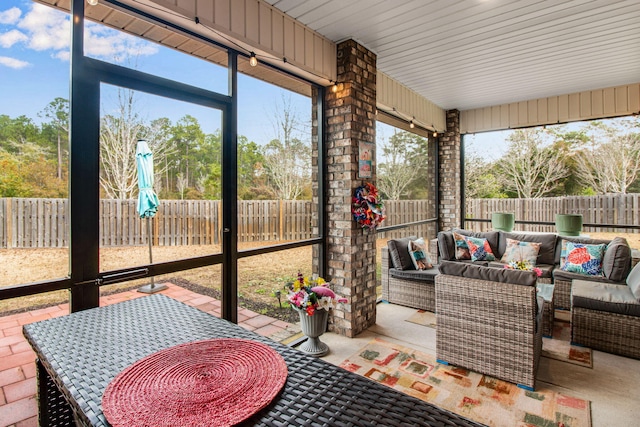 sunroom / solarium with a wealth of natural light