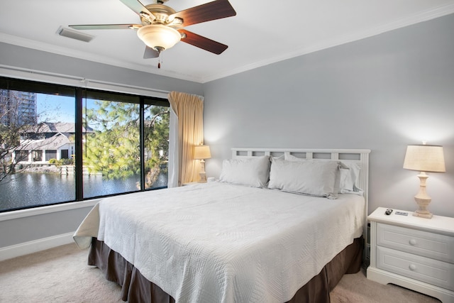 bedroom featuring ceiling fan, light carpet, and multiple windows