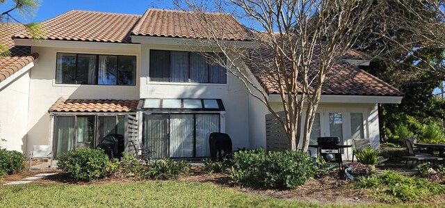 back of house with french doors