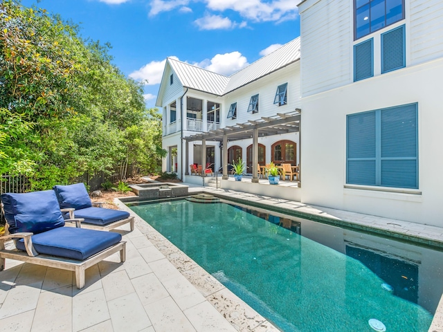 view of swimming pool with a patio area