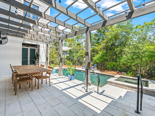 view of swimming pool featuring an in ground hot tub and a patio area