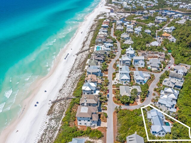 drone / aerial view with a view of the beach and a water view