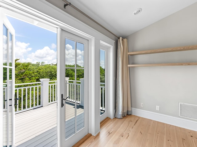 107 E Bermuda Dr, Santa Rosa Beach, FL 32459 - entryway with wood finished floors and baseboards