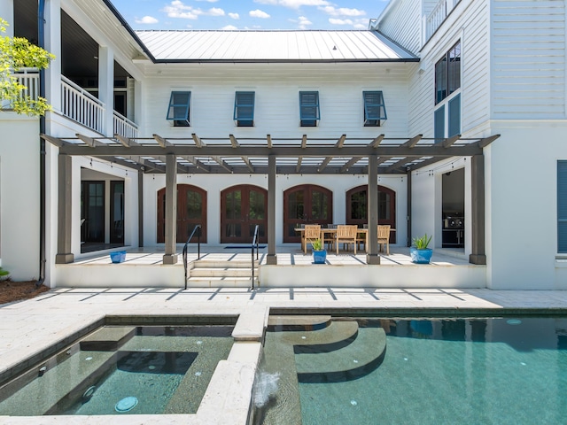 107 E Bermuda Dr, Santa Rosa Beach, FL 32459 - rear view of property featuring a pergola, a patio area, and an outdoor pool