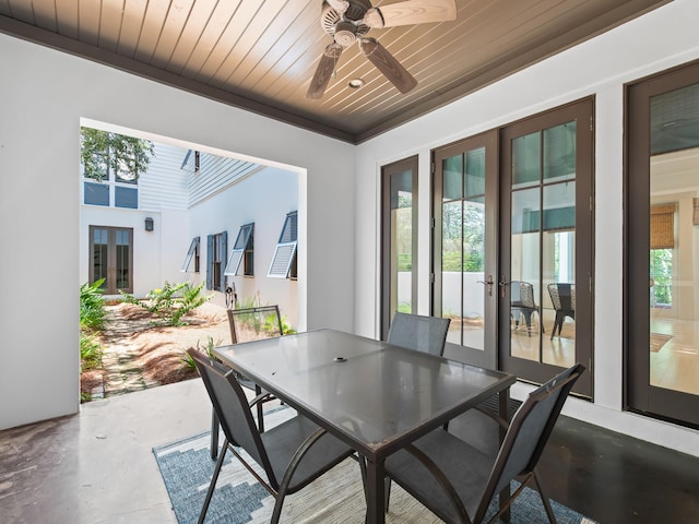 107 E Bermuda Dr, Santa Rosa Beach, FL 32459 - view of patio with outdoor dining area, a ceiling fan, and french doors
